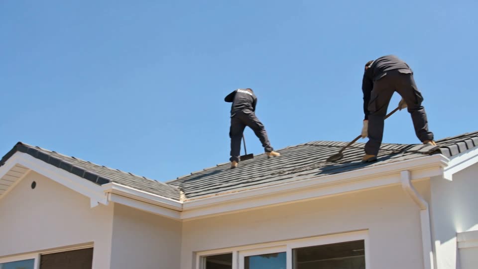 Asbestos Removal Pretoria - contractors stripping asbestos cement roof sheets from a house roof